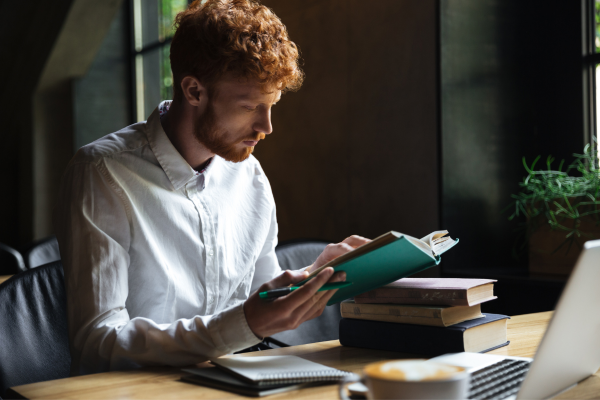 Reading Your Way to Targeted Submissions CANVA Red hair reading