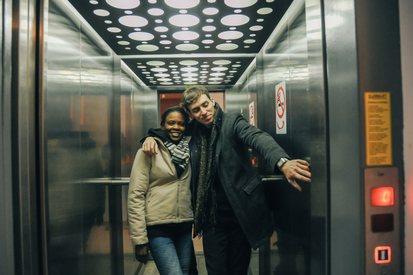 4 Tips for Writing Teen Romance CANVA Couple in elevator stuck