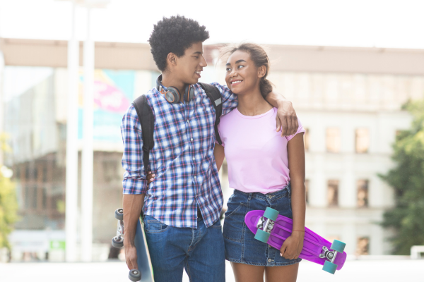 4 Tips for Writing Teen Romance CANVA Teen Couple skateboard