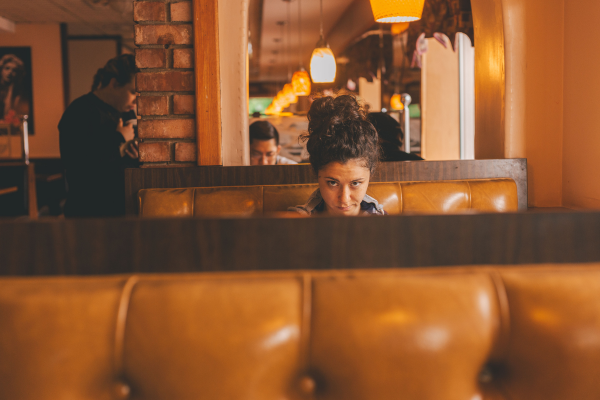 Girl in Cafe - photo credit Craig Adderley Pexels